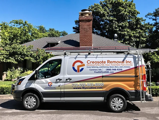 Parma Heights Chimney Sweep technician removing creosote safely in Parma Heights, OH